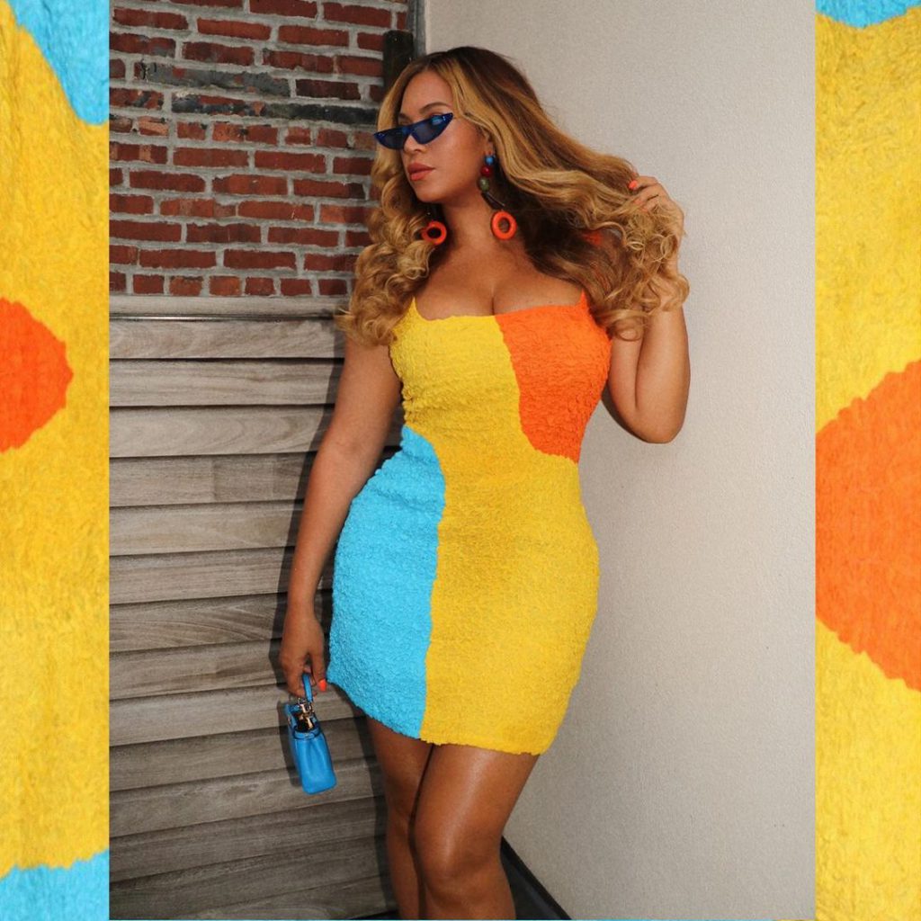Beyonce in Neon terry mini dresses