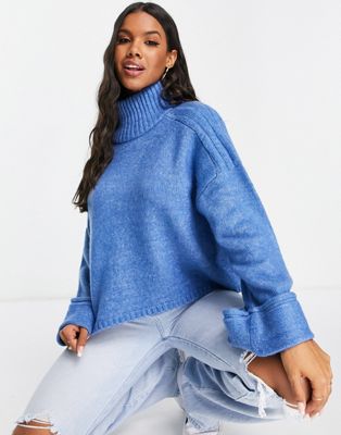 ASOS DESIGN boxy jumper with high neck and turn back cuff in blue £28.00