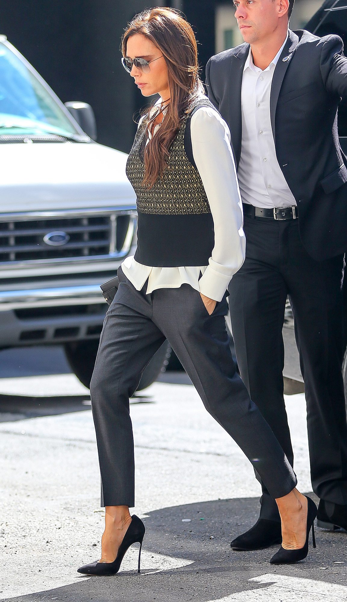 Victoria Beckham spotted in a grey sweater vest